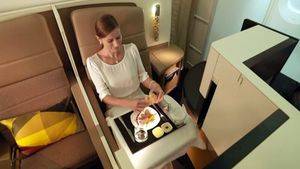 Etihad Airways B787. Business Studio Dining Female Guest